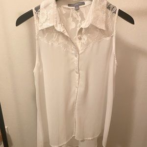 Sleeveless button down dress top.